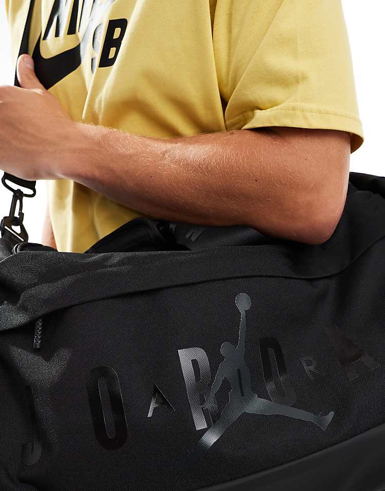 https://images.asos-media.com/products/jordan-jam-velocity-duffle-bag-in-black/206499767-4?$n_750w$&wid=750&fit=constrain