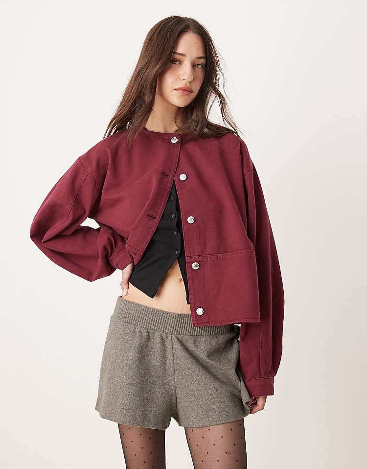 ASOS DESIGN denim collarless jacket in burgundy